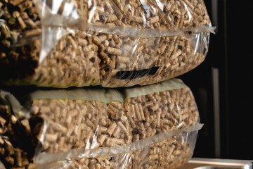 Stack of pellet bags, renewable energy, compressed wood, alternative lifestyle