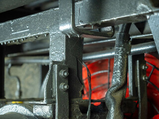 Industrial background, closeup of details of mechanism of steam engine