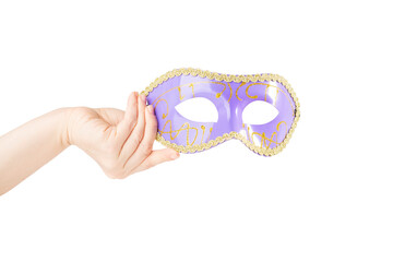 Carnival mask in hand, blue vintage masquerade accessory isolated