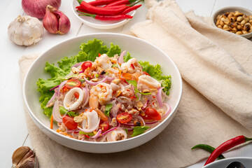 Spicy Glass Noodle Salad,mixed shrimp with minced pork and squid with boiled vermicelli in chili...