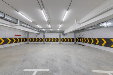 Empty underground parking lot or garage interior