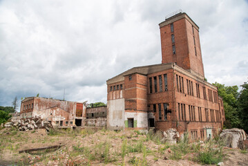 Fototapeta na wymiar Old destroyed factory in Poland. Urbex made of brick.