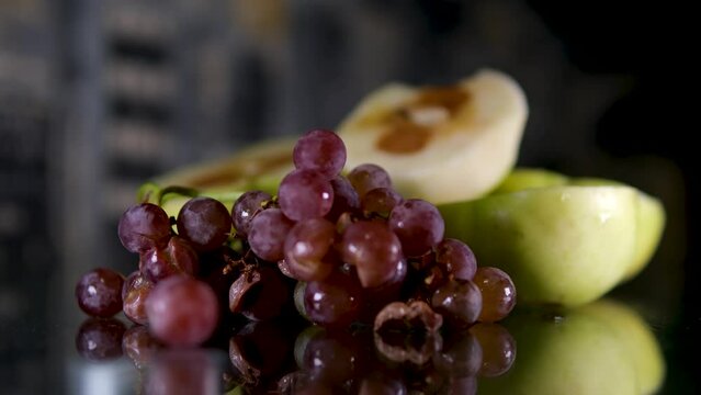 Expired grapes are thrown away for disposal and recycling. rotten apples, grapes Organic waste. High quality 4k footage