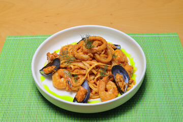 Seafood Spaghetti with Tiger Prawns, Scallops, Mussels, Calamari, Salmon and Tomato Sauce