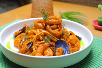 Seafood Spaghetti with Tiger Prawns, Scallops, Mussels, Calamari, Salmon and Tomato Sauce