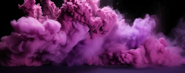 Explosion of mauve colored powder on black background