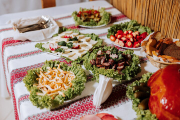 Cossack table. Banquet hall Meat treats for guests. Homemade cutouts. Pork tenderloin. Delicious meat cuts. Meat plate. Delicious compositions from smoked mint. Cottage cheese.