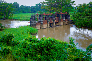 Fototapeta premium A dam was built in the middle of a small river which is still functioning in Sri Lankla