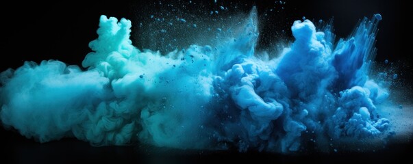 Explosion of aquamarine colored powder on black background
