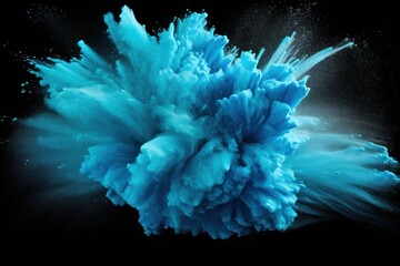 Explosion of aqua blue colored powder on black background