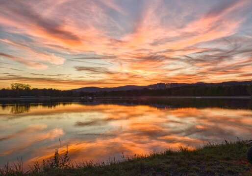 Fiery sunset on the water © DanyG