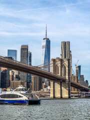 View of the Famous Skyline of New-York downtown with Brooklyn Bridge Tower and One World Trade...