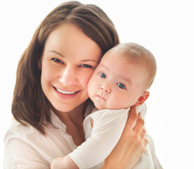 Portrait of mother and child laughing and playing