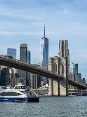 View of the Famous Skyline of New-York downtown with Brooklyn Bridge Tower and One World Trade...