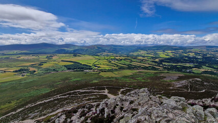 Reveling in the breathtaking majesty of the Wicklow Mountains, captured from the summit of the...