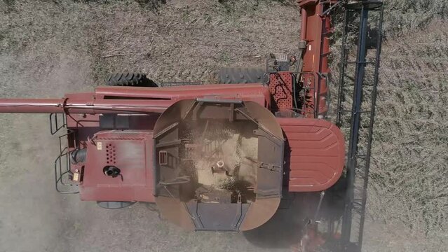 harvesting soybeans drone aerial Plong&eacute;e camera horizontal harvester filmed from above up close