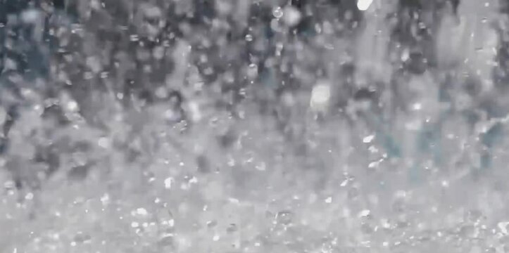 Water bubbles created by splashing and fast flowing water
