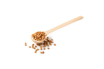 Buckwheat in wooden spoons. Buckwheat grain isolated on white background. Healthy food. Porridge. Diet. Organic cereal