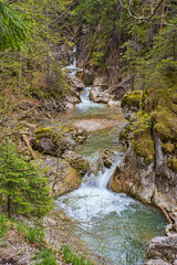 Mountain river in a rocky landscape - 703418150