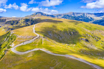 Beautiful mountain road viewed from above - 703418157