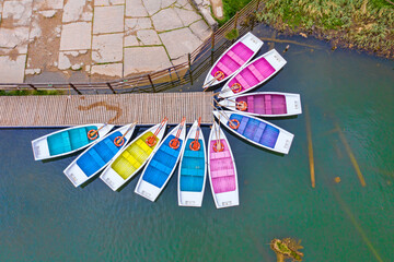 Above view of colored docked boats - 703418371
