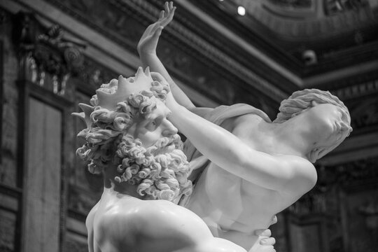 mRome, Italy - August 4th, 2022: The Rape of Proserpina (Italian: Ratto di Proserpina), or Abduction of Proserpina, is a large Baroque marble group sculpture by  Gian Lorenzo Bernini