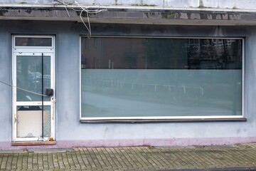 abandoned derelict store with shop window