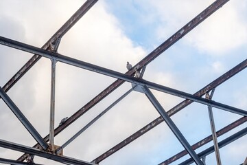 rusted roof truss of an old industrial building