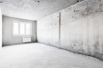 interior of the apartment without decoration in gray colors. rough finish