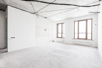 interior of the apartment without decoration in gray colors. rough finish