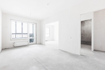 interior of the apartment without decoration in gray colors. rough finish