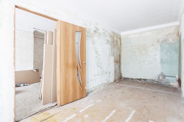 interior of the apartment without decoration in gray colors. rough finish