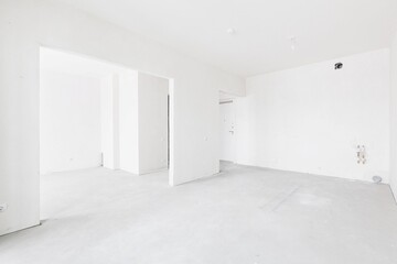 interior of the apartment without decoration in gray colors. rough finish