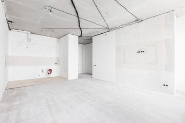interior of the apartment without decoration in gray colors. rough finish