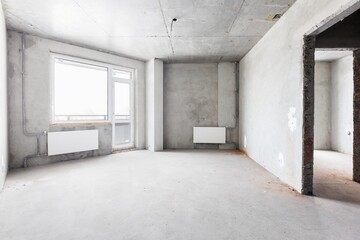interior of the apartment without decoration in gray colors. rough finish