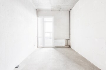 interior of the apartment without decoration in gray colors. rough finish
