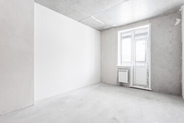 interior of the apartment without decoration in gray colors. rough finish