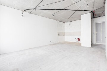 interior of the apartment without decoration in gray colors. rough finish