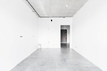 interior of the apartment without decoration in gray colors. rough finish