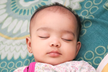 cute Indian little child sleeping close up