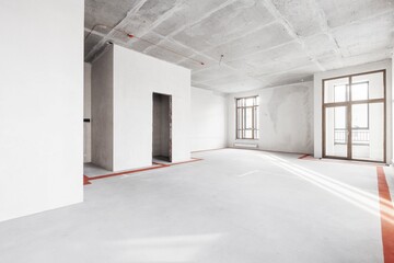 interior of the apartment without decoration in gray colors. rough finish