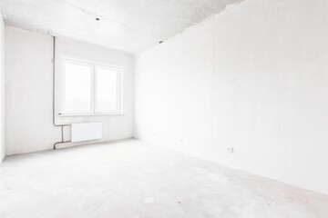 interior of the apartment without decoration in gray colors. rough finish