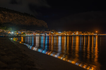 Obraz premium Landscape of Mondello Beach Near The City Of Palermo, In The South Of Italy Illuminated At Night In Summer