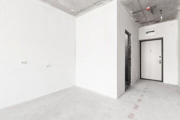 interior of the apartment without decoration in gray colors. rough finish