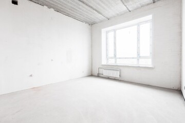 interior of the apartment without decoration in gray colors. rough finish