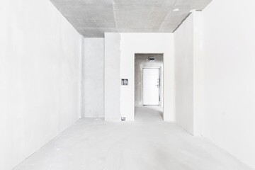 interior of the apartment without decoration in gray colors. rough finish