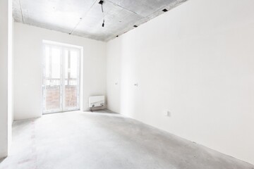 interior of the apartment without decoration in gray colors. rough finish