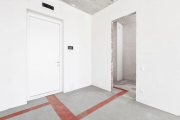 interior of the apartment without decoration in gray colors. rough finish