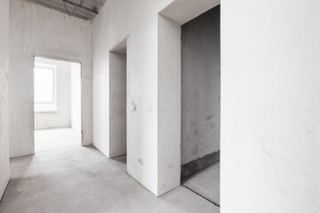 interior of the apartment without decoration in gray colors. rough finish