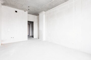 interior of the apartment without decoration in gray colors. rough finish
